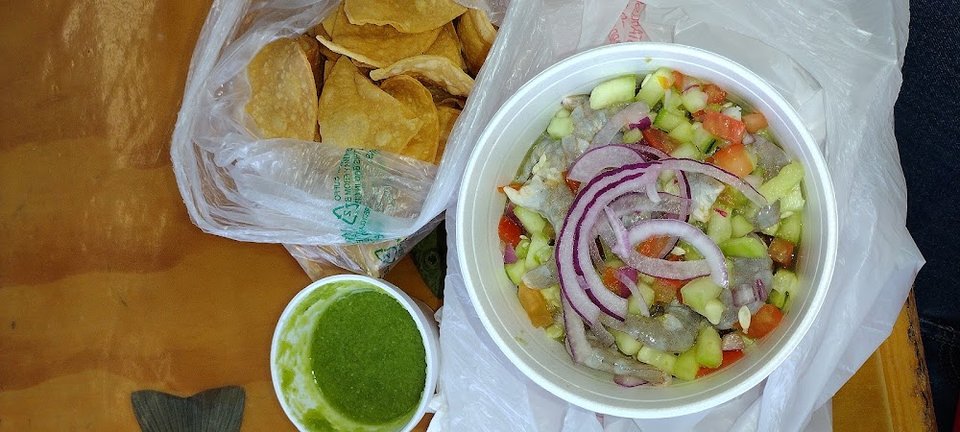 Restaurant menu featuring Mexican seafood selections.